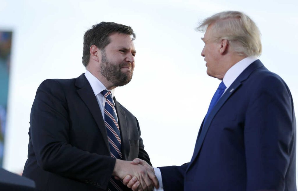 FILE - Senate candidate JD Vance, left, greets former President Donald Trump at a rally at the Delaware County Fairground, April 23, 2022, in Delaware, Ohio, to endorse Republican candidates ahead of the Ohio primary on May 3. High-profile surrogates for Republicans running in Ohio’s hotly contested Senate primary are fanning out across the state or holding other events to give their endorsed candidates a last-minute boost ahead of Tuesday’s election. Sens. Josh Hawley, Ted Cruz and Rand Paul, along with Reps. Matt Gaetz and Marjorie Taylor Greene, were among the conservative emissaries making final pitches in the critical Senate race.  (AP Photo/Joe Maiorana, File)